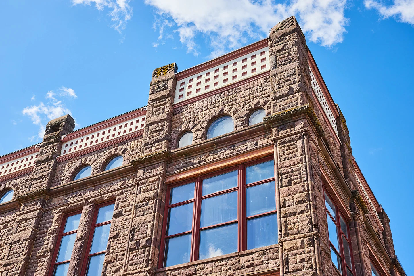 Early masonry construction — the labor-intensive methods GFRC replaces